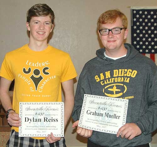 Dylan  Riess, left, and Graham Mueller, seniors at Stewartville High School, accepted certificates last week stating that they have each earned $400 college scholarships courtesy of the Stewartville Kiwanis Club.