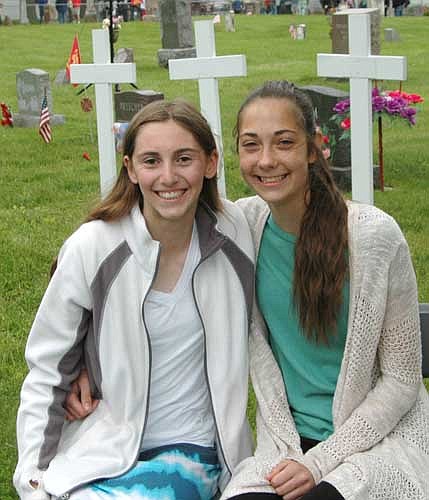Alyssa Jones, left, and Olivia Otto, eighth graders at Stewartville Middle School, were the featured speakers at Stewartville's annual Memorial  Day ceremony at Woodlawn Cemetery on Monday, May 29.