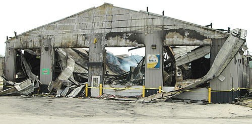 An early-morning fire destroyed a truck service center in Racine on Friday, May 26. More than a day later, the remains from the fire continued to smolder. As of last week, authorities weren't sure what caused the blaze.