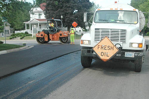 Work crews put the last coat of asphalt on Fourth Street Northeast last week, completing a project that began during the summer of 2016. Swenke Ims Contracting LLC of Kasson rebuilt the street, along with Fifth Street Northeast, Third Avenue Northeast and Sixth Avenue Southwest, last summer.