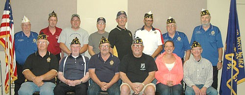 Several guests installed new 2017-18 officers for the Stewartville American Legion Post 164 on Monday evening, June 19. Incoming officers include, front row, from left, Wes Alrick, judge advocate; Jerry Korstad, chaplain; Roger Peterson, commander; Richard Paulson, first vice commander; Kristin Anderson, second vice commander; and Roger Barsness, adjutant. Back row, from left, Richard Skillestad, deputy vice commander; Glenn Mueller, district officer; Chet Finley, finance officer; Dennie Voll, historian; Dean Ramaker, sergeant-at arms; Scott Ihrke, first district vice commander; Wayne Hammon, first district adjutant; and Gary Miller, first district membership chair.