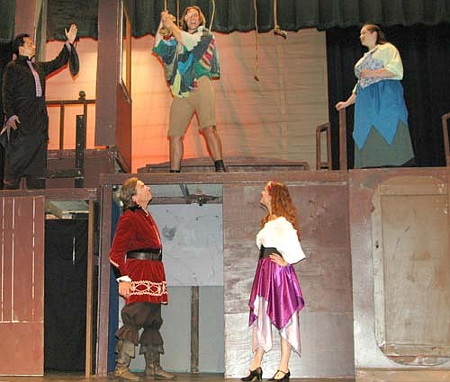 Frollo (Raul Jalmasco), top left, and Florika (Melissa Kloempken), top right, want&#160;Quasimodo (Dave Stepan), top center, to stop ringing the cathedral&#160;bells during a dress rehearsal for Stewartville Community Theatre's upcoming presentation of "The Hunchback of Notre Dame." Standing below, the&#160;Captain (Randy Peterson) and Esmeralda (Lisa Modry) don't seem to mind the music.