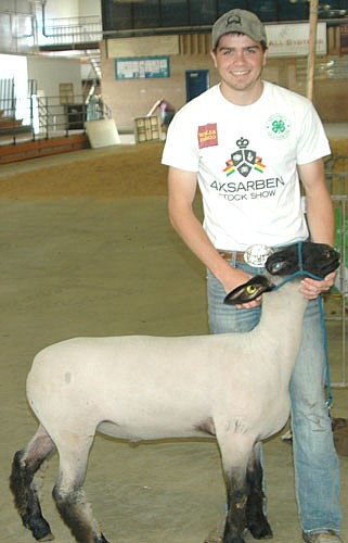 Mitch Osterhus, a 2017 graduate of Stewartville High School and a member of the SHS FFA, showed five sheep, including the black-faced market lamb above, and three hogs at this year's Olmsted County Fair.