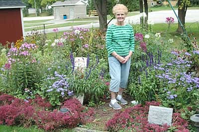Mary Lynch of Stewartville enjoys spending time in her backyard garden, which includes phlox, red sedum, perennial sweet pea, coneflowers, tall ageratum and more. Every year for Mother's Day, her children give her gift certificates for purchasing items at flower centers. Some years, she'll spend four or five hours a week in her garden, although she didn't do so this summer. "This year, it came through in spite of me," she said with a smile. Gardening gives her a sense of tranquility. "There's peace and enjoyment," she said. "You appreciate nature, and all God's blessings, so much when you're out in it."