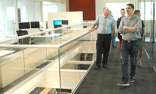 en Conway, president of Halcon, in foreground at right, led members of the Stewartville Economic Development Authority (EDA) on a tour of Halcon's new administration building on June 21, 2016. Bill Schimmel Jr., Stewartville's city administrator, stands at left. Halcon will host another  tour to celebrate local Manufacturing Week on Tuesday, Oct. 3.