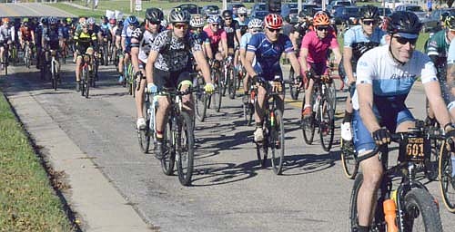More than 700 riders took part in the fifth annual "Filthy 50" bicycle event on Sunday, Oct. 8. The participants started and finished from the parking lot near the Fareway grocery store in Stewartville. Above, riders fill the street as they start their journey. Peter Olejnikzac was the overall winner of this year's event, setting a course record of 2 hours, 20 minutes and nine seconds.