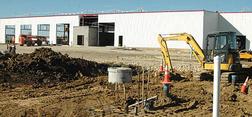 Workers continue to develop a new Peterbilt Truck Center at the Schumann Business Park. The company, which will employ 20 to 25 workers and could expand to hire up to 50 people, will be open 24 hours a day. Peterbilt sells, repairs, services and displays trucks. The City Council, at its Oct. 10 meeting, agreed to grant a conditional use permit to La Crosse Sign Co. to erect a 75-foot high Peterbilt sign.