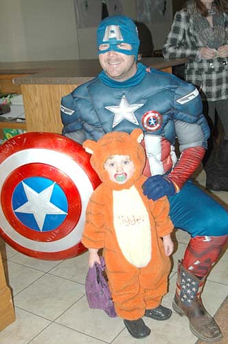 Edward Kruger of Rochester dressed as Captain America and Emery, his 1 1/2-year-old daughter, was Tigger at the annual Halloween party at the Stewartville American Legion Post 164 on Tuesday afternoon, Oct. 31.