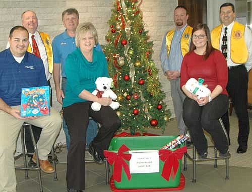 Members of the Stewartville Lions Club visited Bremer Bank last week to collect items donated by Stewartville and area residents to the Lions Club's annual Christmas Anonymous gift and fund drive. Bremer Bank employees include, front row, from left, Kyle Benish, Ann Lutteke and Beth Henkel. Lions members, in back from left, include Bill Schimmel Jr., Dr. David Thompson, Mike Rainey, also a Bremer employee, and Troy Knutson.