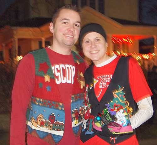Amber Herbrand, posing with her husband Michael, was the first-place winner of the first-ever Winterfest Ugly Sweater Run.