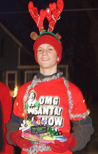 Mikey Crom won the prize for wearing the ugliest sweater at the first-ever Winterfest Ugly Sweater Run on Saturday, Dec. 2.