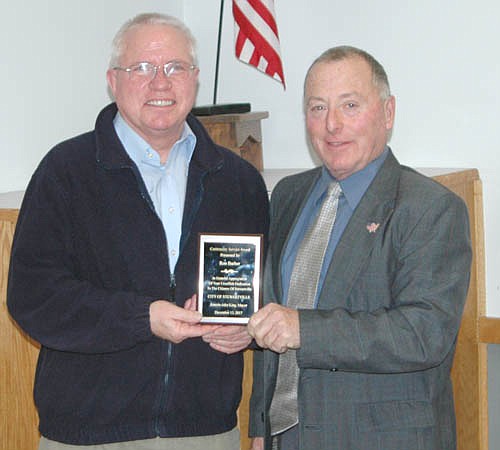Ron Barber, left, accepts the Mayor's Award for Community Service from Mayor Jimmie-John King at the city of Stewartville's annual awards and recognition event at the Stewartville Civic Center on Wednesday, Dec. 13.