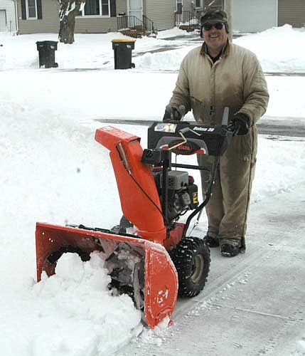 Lester Johnson of Stewartville was busy with his snow blower last week after a winter storm dropped almost seven inches of snow on Stewartville and the area on Monday, March 5 and Tuesday, March 6.