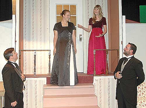 Eliza, (Katie Eberhard, center) is ready for the ball during a dress rehearsal for Stewartville Community Theatre's upcoming performance of My Fair Lady. Mrs. Langtry (Poppy Lear) presents her to Higgins (Rob Meyer, left) and Colonel Pickering (Anthony Menz, right.) The show will be presented at the Stewartville High School Performing Arts Center this Friday, Aug. 3 and Saturday, Aug. 4 at 7:30 p.m. both evenings, and again on Friday, Aug. 10 and Saturday, Aug. 11 at 7:30 p.m. both evenings, and on Sunday, Aug. 12 at 2 p.m. 