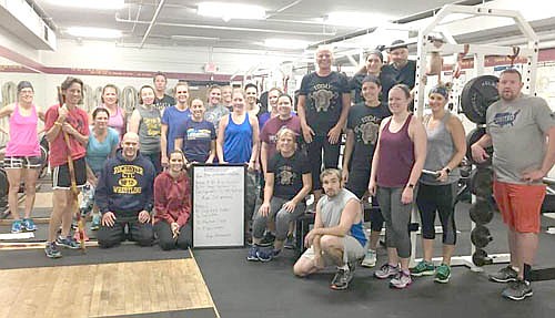 Dawn Miller, a health and physical education teacher at Stewartville Middle School, in the red shirt second from left, has been the Stewartville Community Education Stewie Kraze coach for two years. In that capacity, she leads early-morning workouts that focus on improving strength and cardiovascular conditioning for local and area adults. Stewie Kraze workouts are popular, with an average turnout of 44 to 46 participants per class.
