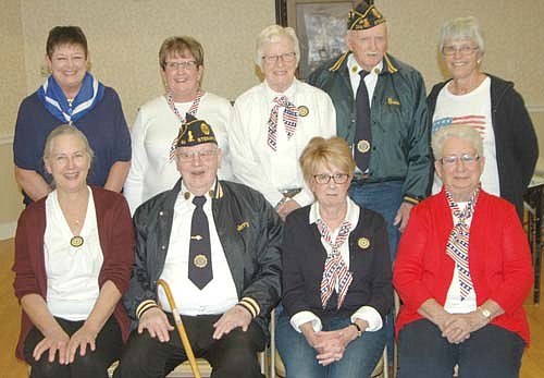 Members of the Stewartville American Legion Post 164 and Auxiliary Unit 164 celebrated Veterans Day on Friday, Nov. 9 by serving cake and ice cream to the residents of the Stewartville Care Center, including many who served in the military. Those who helped included, front row, from left, Barb Ryan, Jerry Korstad, commander of the Stewartville American Legion; Wanda Prescher, president of the Legion Auxiliary; and Audrey Farnsworth. Back row, from left, Peggy Paulson, Diane Ramaker, Delores Peterson, Eugene Reed and Sheila Majerus.