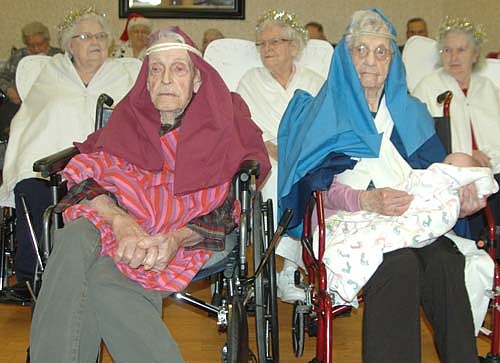 Orven Blegen, in front at left, was Joseph and Myrtle Tebay, in front at right, was Mary when Christmas came to the Stewartville Care Center on Friday, Dec. 21. Blegen and Tebay are both 101 years old. In back, from left, are angels Vada Logan, Evelyn Galligos and Helen Hotopp.