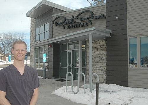 Dr. Zachary Lechner poses near the new 4,356 square-foot Root River Dental office along Stewartville's Main Street last week. The facility opened for patient care on Dec. 3, 2018. The Root River Dental office is one of a number of new commercial buildings that have been built in Stewartville recently. The others, all built in the Schumann Business Park, include Sprouts Childcare &&#8200;Early Education Center, Peterbilt and Bobcat.